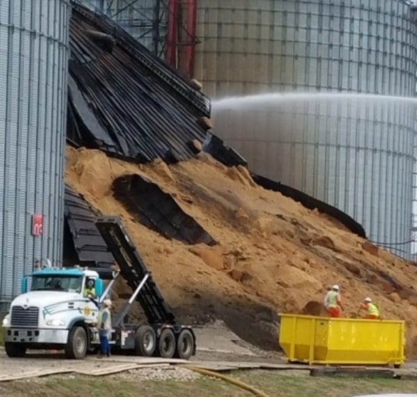 roll-off dumpster and collapsed silo